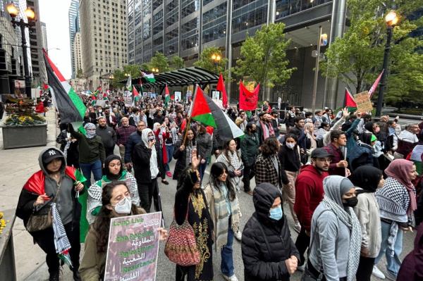 Palestinian-Americans and their supporters march as the conflict between Israel and the Palestinian militant group Hamas continues, in downtown Chicago, U.S., October 8, 2023.