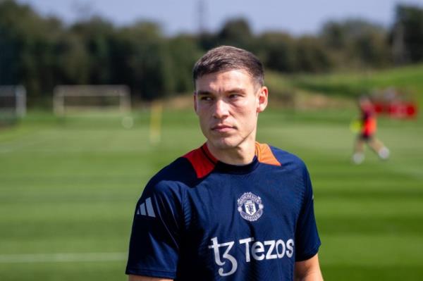 Manuel Ugarte of Manchester United in action during a first team training session at Carrington Training Ground on August 31, 2024 in Manchester, England.