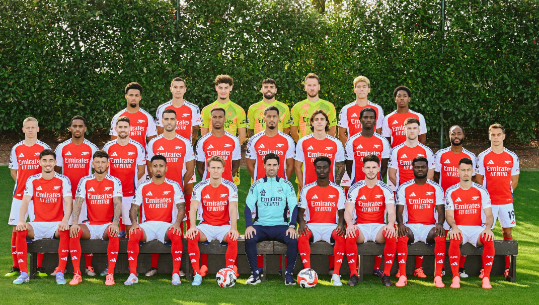 Martin Odegaard's damaged ankle was obscured by a ball in Arsenal's team photo