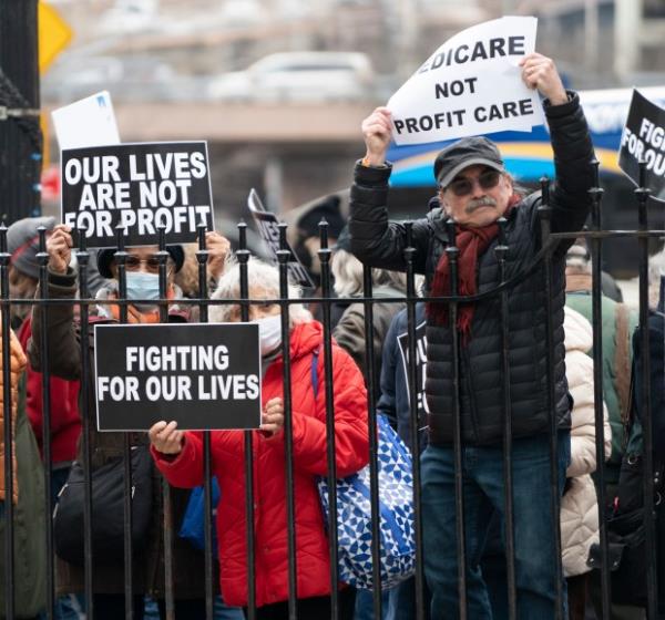 New York City retirees protest outside City Hall Friday, March 31, 2023 in Manhattan, New York in response to his signing a Medicare Advantage Plan contract for retired city employees.