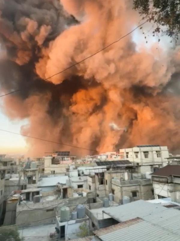 Smoke rises above buildings in Beirut, Lebanon after an Israeli airstrike on Sept. 27, 2024.