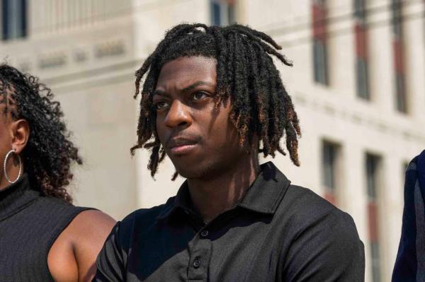 Darryl George stands next to his mother, Darresha George, in front of Galveston County Court House, May 23, 2024, in Galveston, Texas.