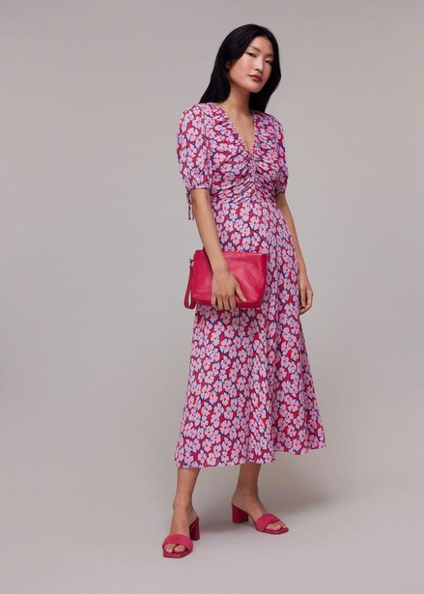 Person wearing a pink floral dress