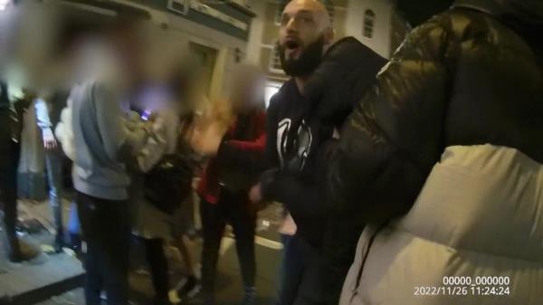 EDITORS NOTE IMAGE BLURRED AT SOURCE Screen grab taken from video dated 26/11/22 issued by Metropolitan Police of Ross Hamilton arguing outside the Viva nightclub in Richmond, before the murder of Reece Newcombe. Hamilton has been found guilty at the Old Bailey of murder and assault by beating. Hamilton had been "spoiling for a fight" and armed himself with a broken bottle before he plunged it into the neck of Reece Newcombe, 31, on Richmond Bridge in south-west London in the early hours of Nove