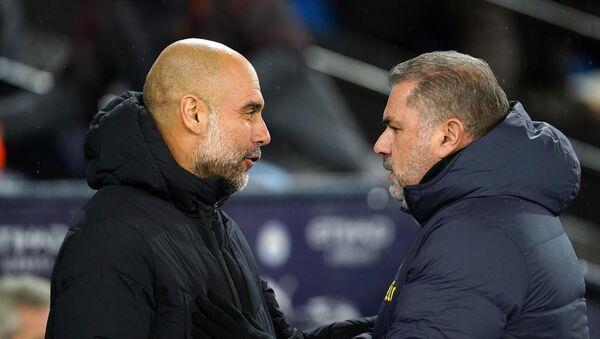 Pep Guardiola (left) and Ange Postecoglou before the Premier League match at the Etihad Stadium. Pep Guardiola (left) and Ange Postecoglou before the Premier League match at the Etihad Stadium.