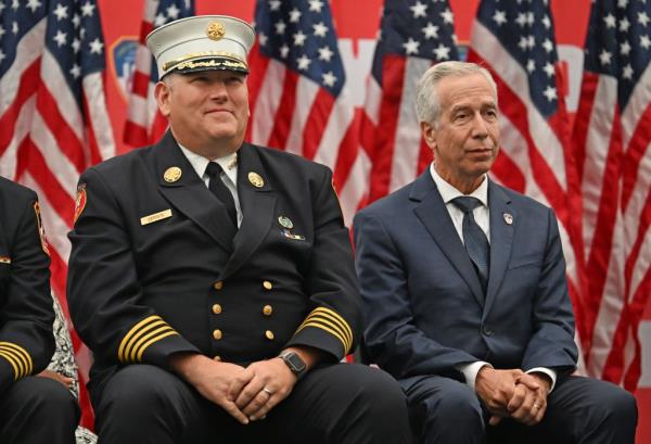 First Deputy Commissioner Joseph Pfeifer (right) addressed the crowd with Acting Chief of Department John Esposito
