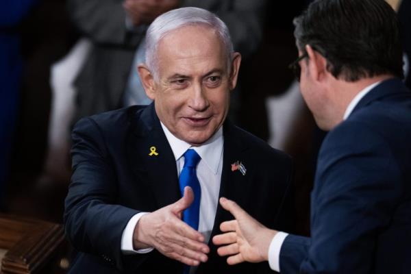 Israeli Prime Minister Benjamin Netanyahu greets Speaker of the House Mike Johnson before addressing a joint meeting of Congress in the House chamber of the U.S. Capitol on Wednesday.