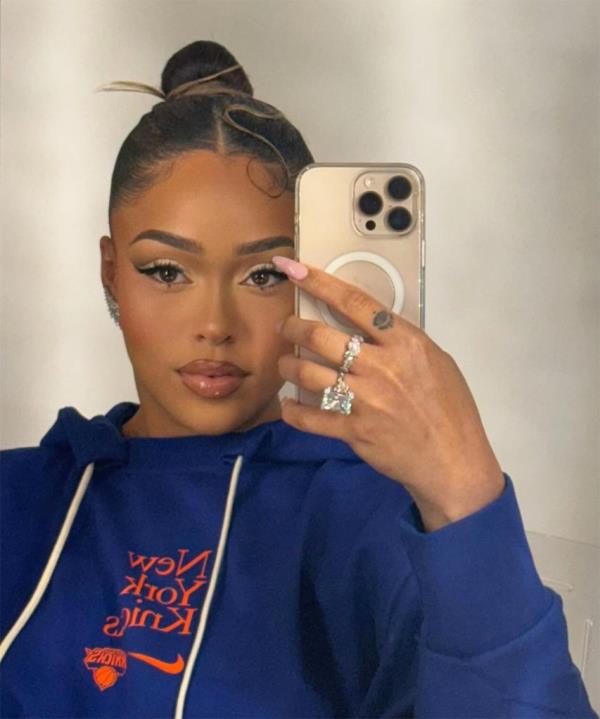 Jordyn Woods showed off a massive diamond ring in new photos after her boyfriend Karl Anthony-Towns was traded to the Knicks.