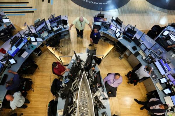 Wall Street mostly down as investors digest corporate results