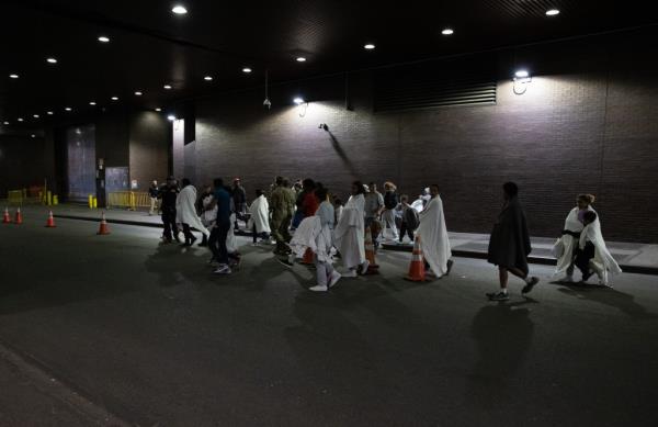 A second bus of migrants arrives at the Port Authority Bus Terminal in Manhattan, Monday, Oct. 9, 2023.