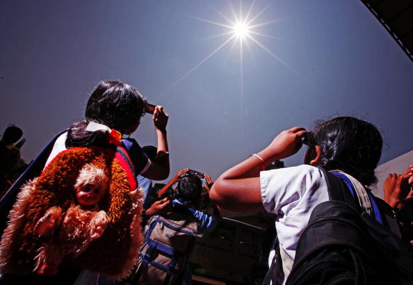People watching a solar eclipse