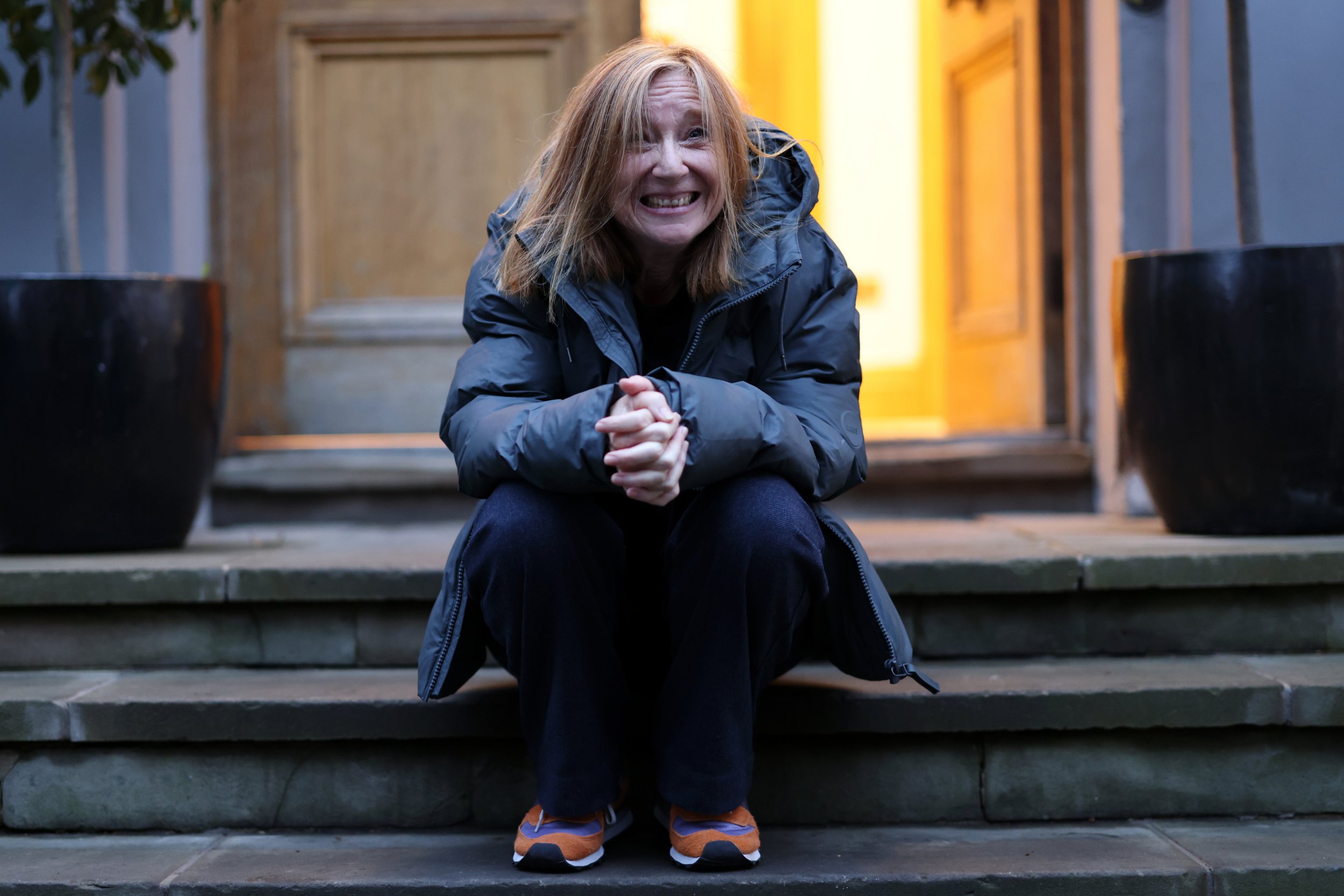Beth Gibbons sits on steps outside the Mercury Music Awards 2024 at Abbey Road Studios