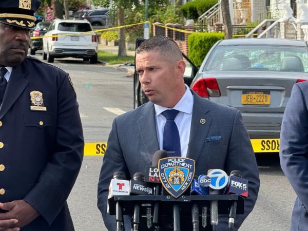 Savino talks to reporters at the scene where the molester crashed his car and died.