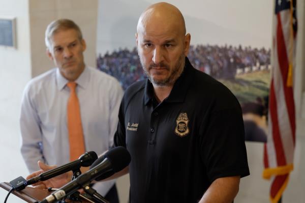 Brandon Judd at a microphone