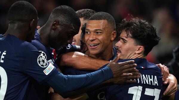 PSG ease past AC Milan to move top of Champions League group