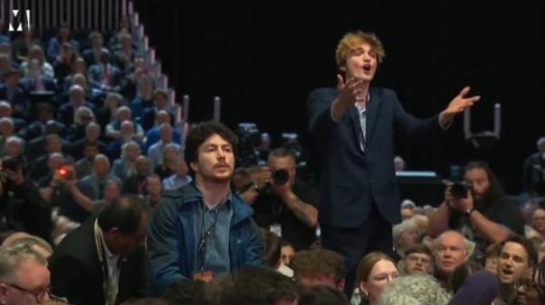 The man was seen yelling at the chancellor
