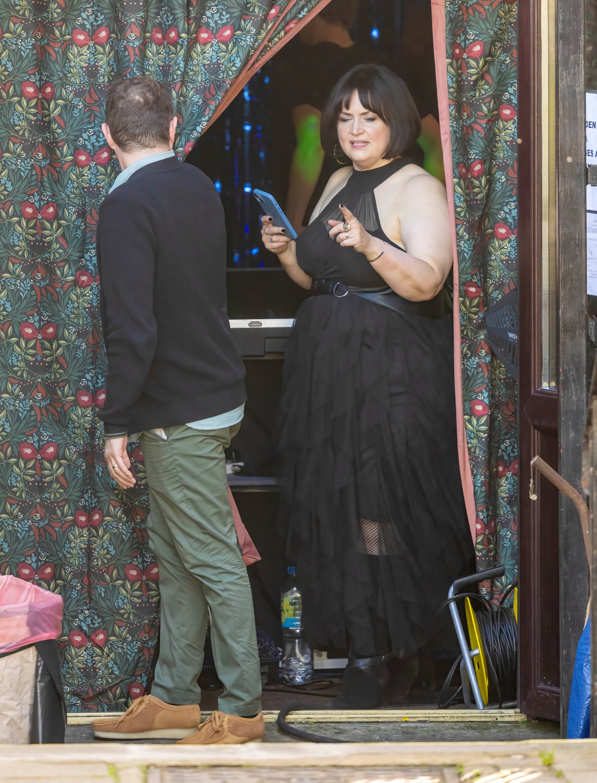 Ruth Jones as Nessa wearing a gothic bridal dress on the Gavin and Stacey set