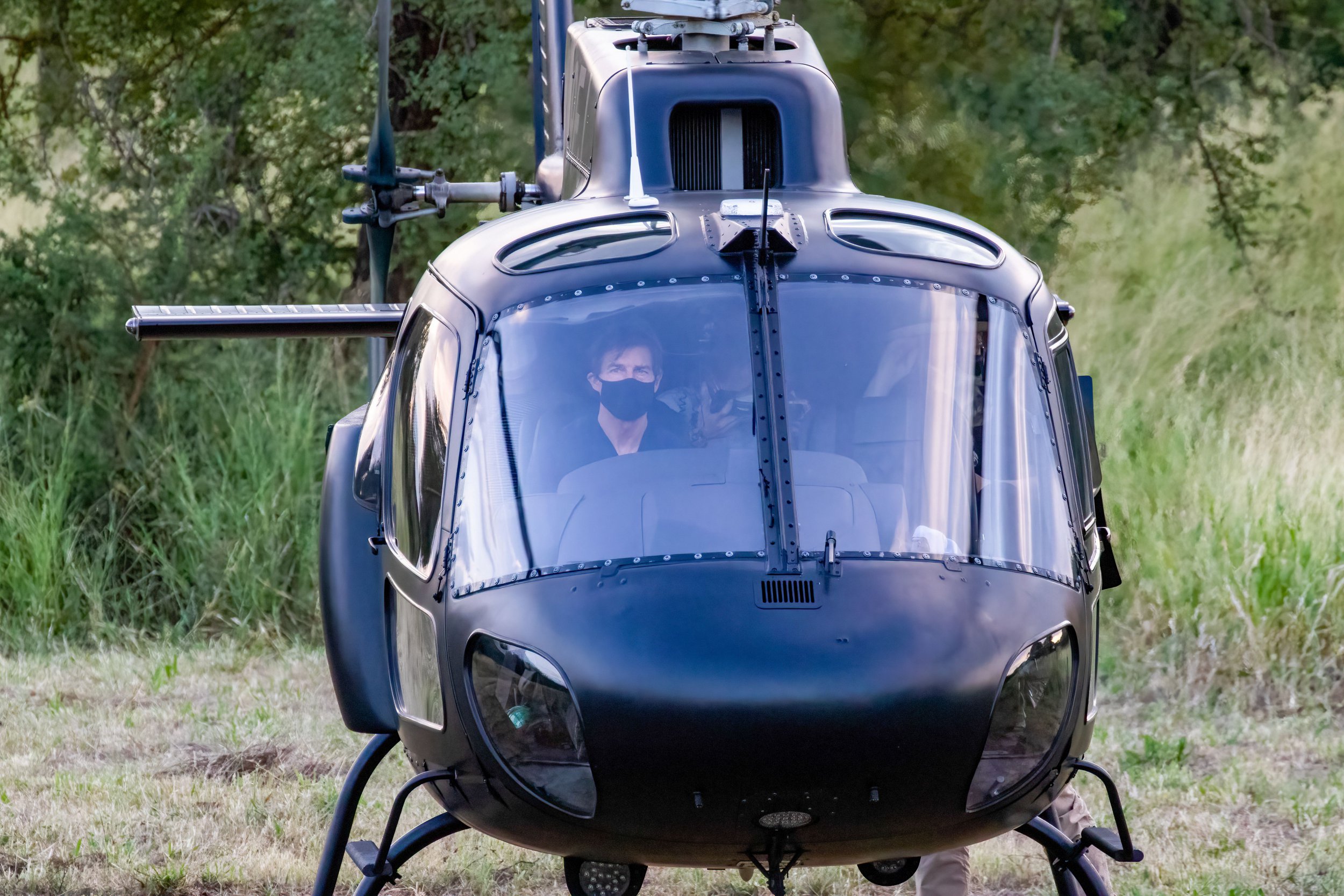 Tom Cruise piloting a helicopter