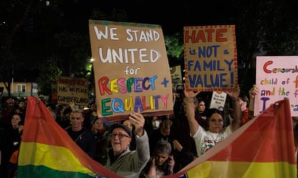 People gather outside the Cumberland city council on 15 May to protest bans on same-sex parenting books and drag story time at local libraries
