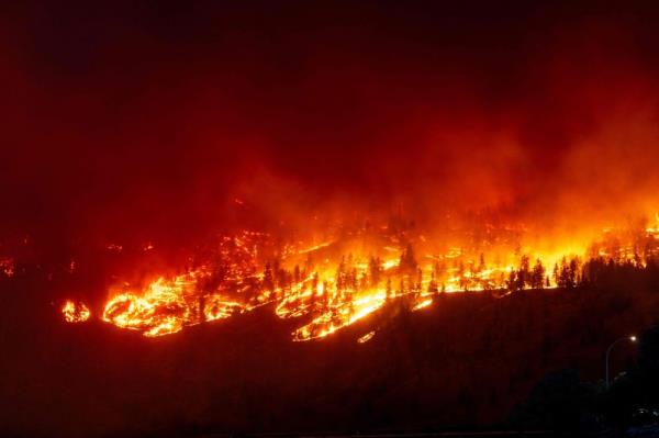 Fires in Canada’s north force another town to evacuate