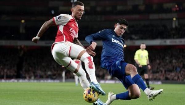 Ben White can't get his cross in with West Ham's Edson Alvarez challenging. Ben White can't get his cross in with West Ham's Edson Alvarez challenging.