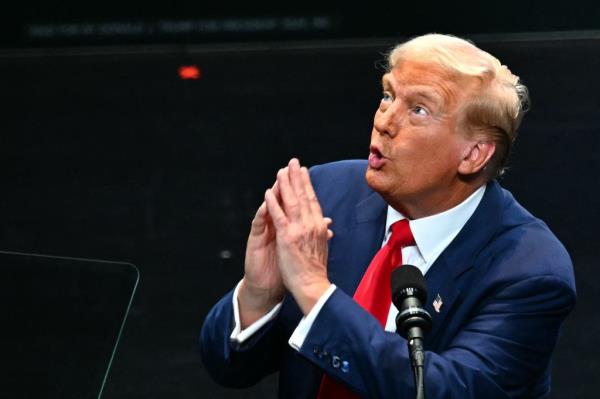 Former US President and Republican presidential candidate Donald Trump speaks during a campaign rally at Johnny Mercer Theatre Civic Center in Savannah, Georgia, on September 24, 2024.