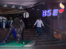 Adani surge helps indices break losing streak on eve of exit polls
