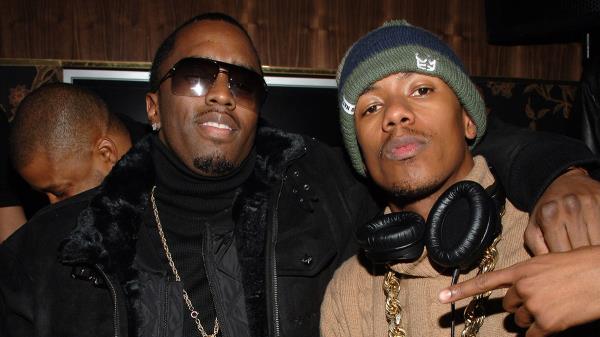Nick Cannon and Diddy wear black suits to a party