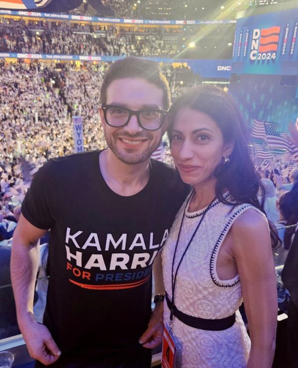 Alex Soros and Huma Abedin posing for a picture at the Democratic National Convention in Chicago