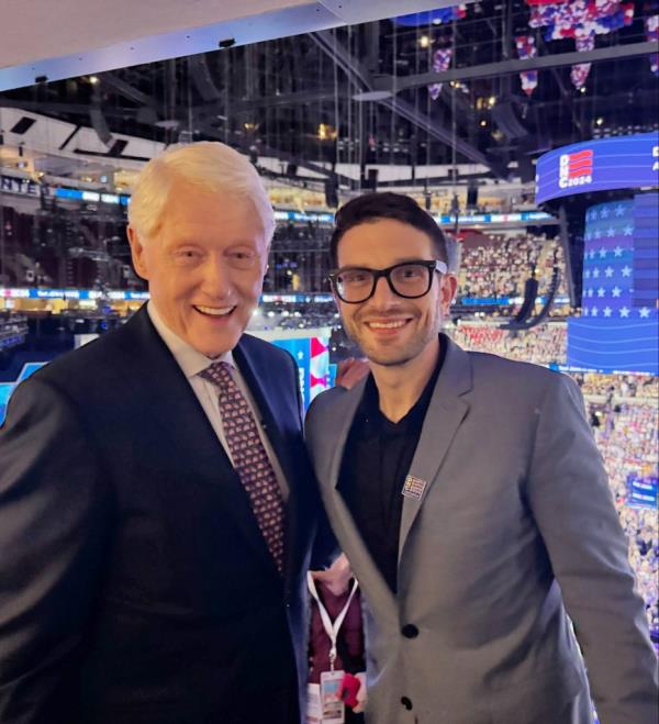 Bill Clinton and Alexander Soros standing together at the Democratic National Convention in Chicago, IL.