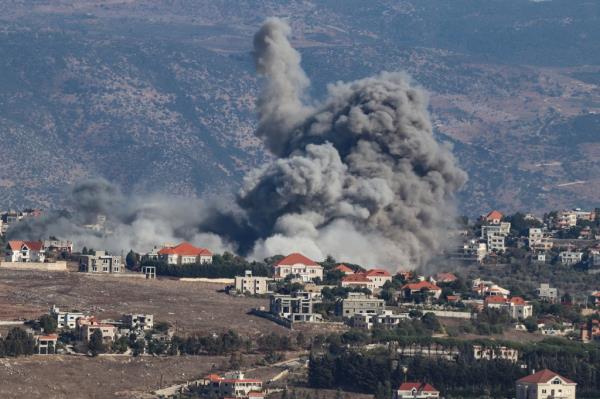 Smoke rises from the site of an Israeli airstrike that targeted the southern Lebanese village of Khiam on September 25, 2024.