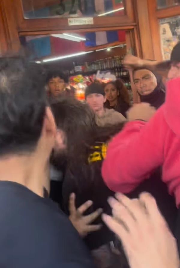 The worker, with his back bent as he took the punches being thrown at him, pulled out a handgun sending the once tough bikers into a frantic dash to escape the area.
