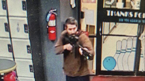 Manhunt underway for man suspected of shooting dead 22 people