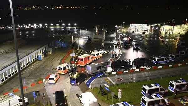 German airport closed after armed man breaches security with his car