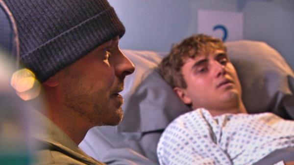 Darren sits by JJ's bedside in Hollyoaks 