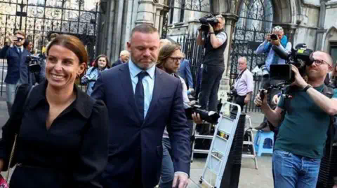 Reuters Coleen Rooney attending the 2022 case with her husband Wayne