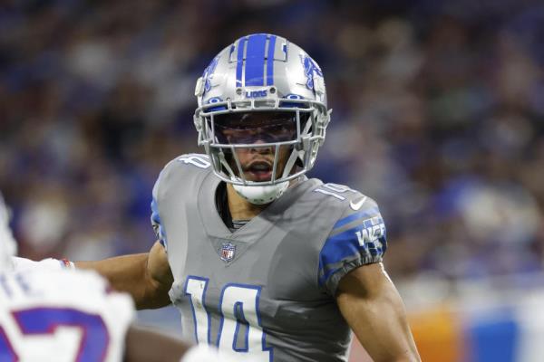 Detroit Lions wide receiver Amon-Ra St. Brown (14) runs a route in the first half against the Buffalo Bills during an NFL football game, Thursday, Nov. 24, 2022, in Detroit. (AP Photo/Rick Osentoski)