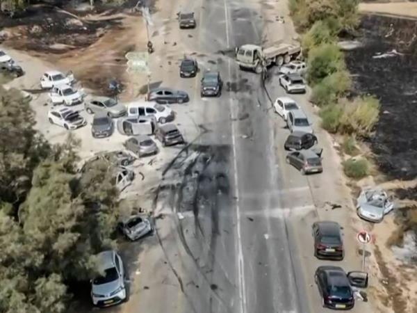 A grab taken from a UGC video posted on the Telegram channel "South First Responders" on October 9, 2023, shows the aftermath of an attack on the Supernova music Festival by Palestinian militants, near Kibbutz Reim in the Negev desert in southern Israel on October 8.