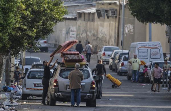 A photo of Palestinians leaving north Gaza.