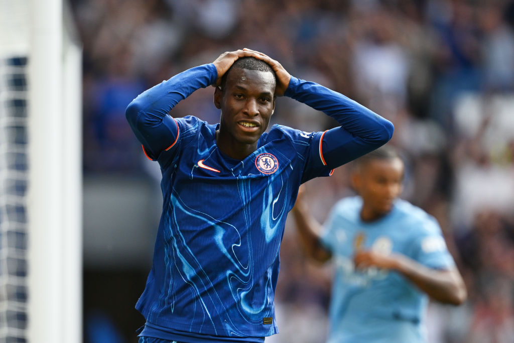 Nicolas Jackson of Chelsea reacts after he scores a goal which was later ruled out for offside during the Premier League match between Chelsea FC and Manchester City