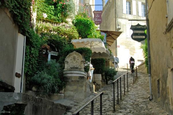 History rises up through the alleys of Saint-Emilion.
