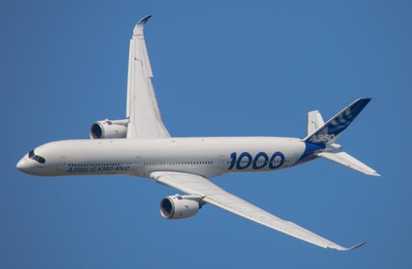 An Airbus A350-100 flying through the sky. The plane could be equipped with new automation features.
