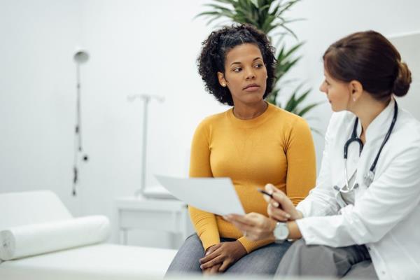 Doctor speaking with patient.