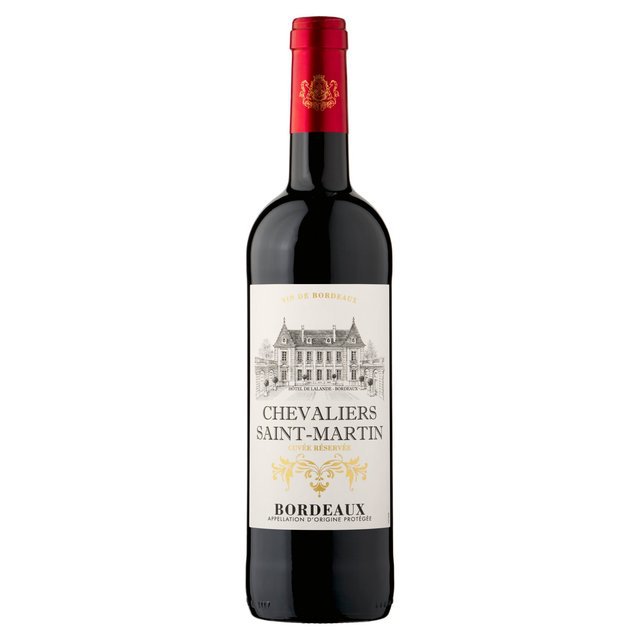A bottle of red wine with a red label.