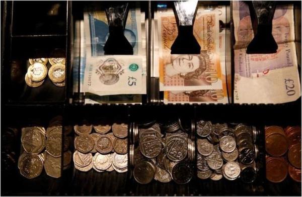 Sterling hits 10-week low as rate hike expectations take a hit