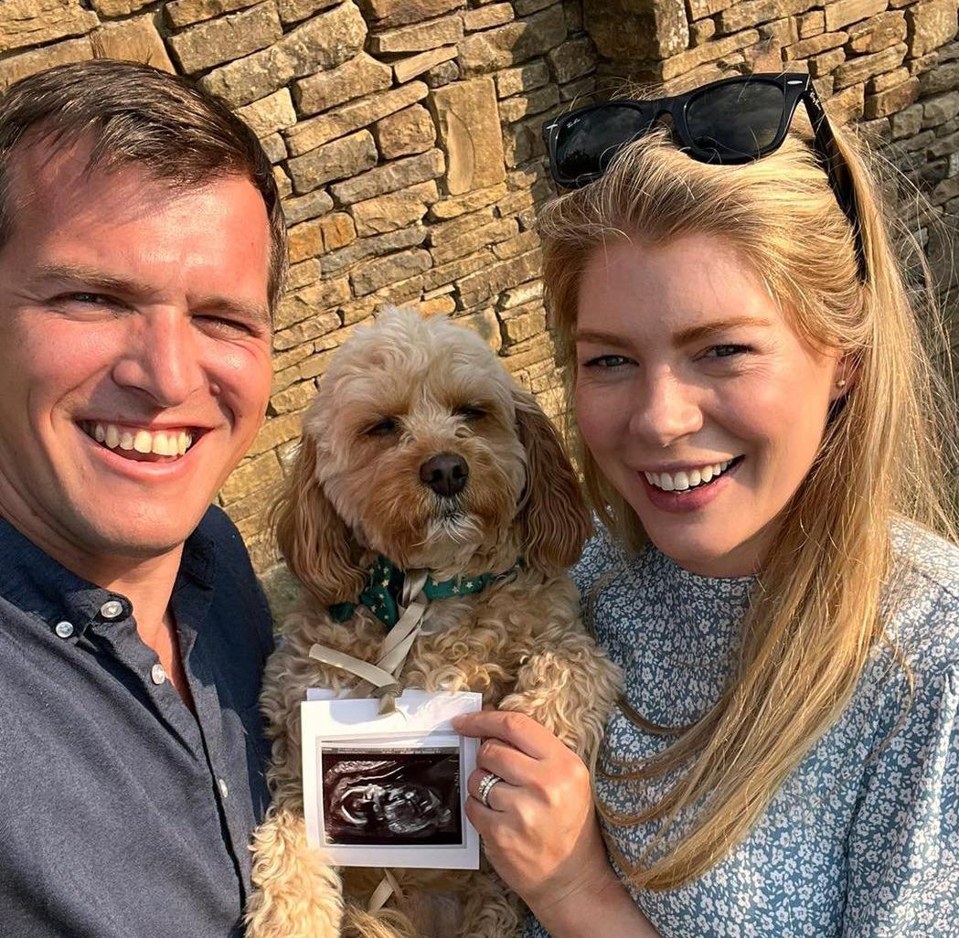 Yorkshire Vet star Matt Jackson-Smith with his wife holding a dog and a baby scan