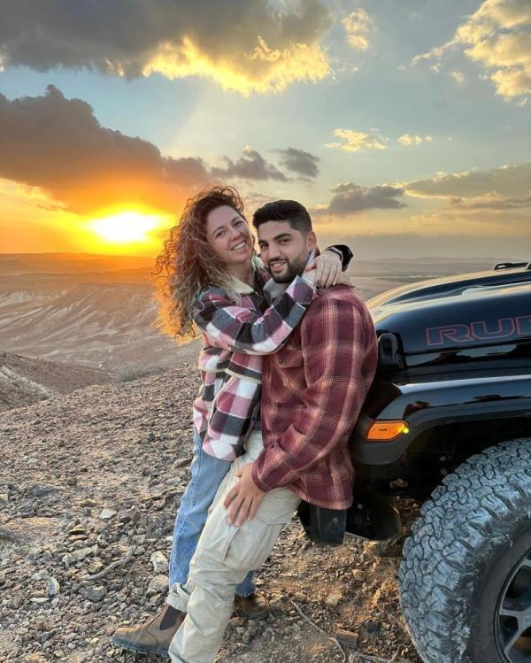 Danielle Waldman and her boyfriend, Noam, right