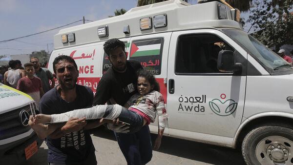 Dozens of Palestinians killed amid fighting in Gaza near hostage release zone