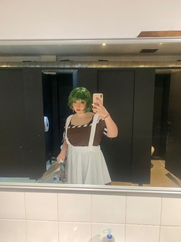 A woman in an Oompa Loompa costume