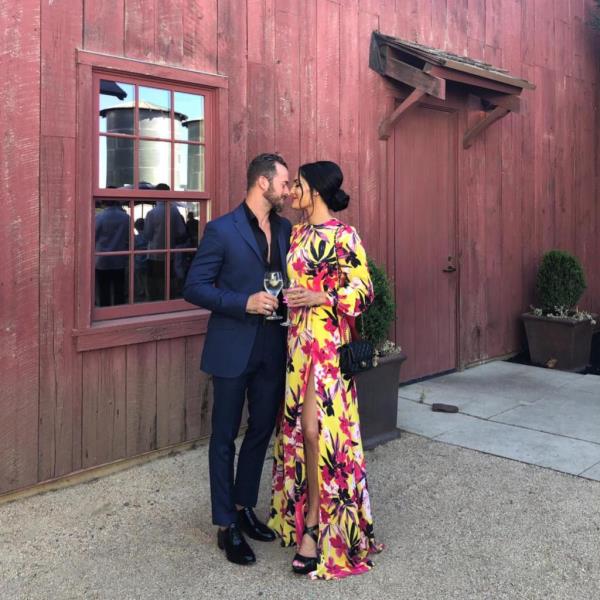 Nikki Bella and Artem Chigvintsev embrace for a photo on social media.